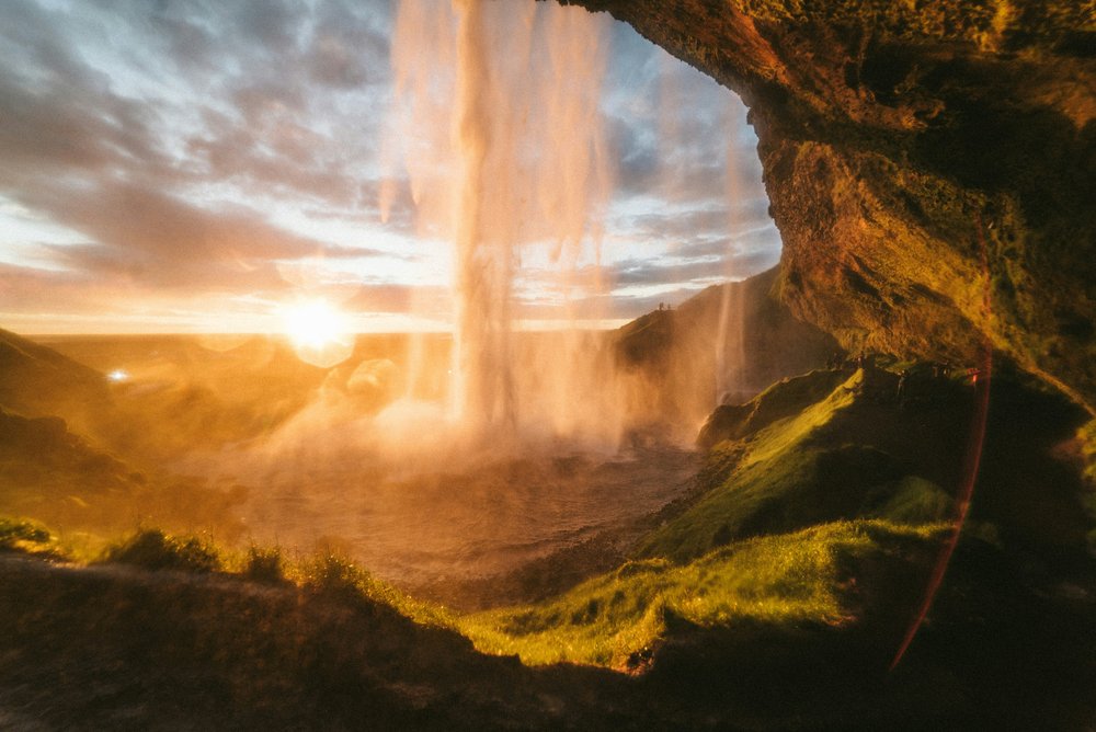 Skogafoss waterfall and black sand beach on Iceland's South Coast