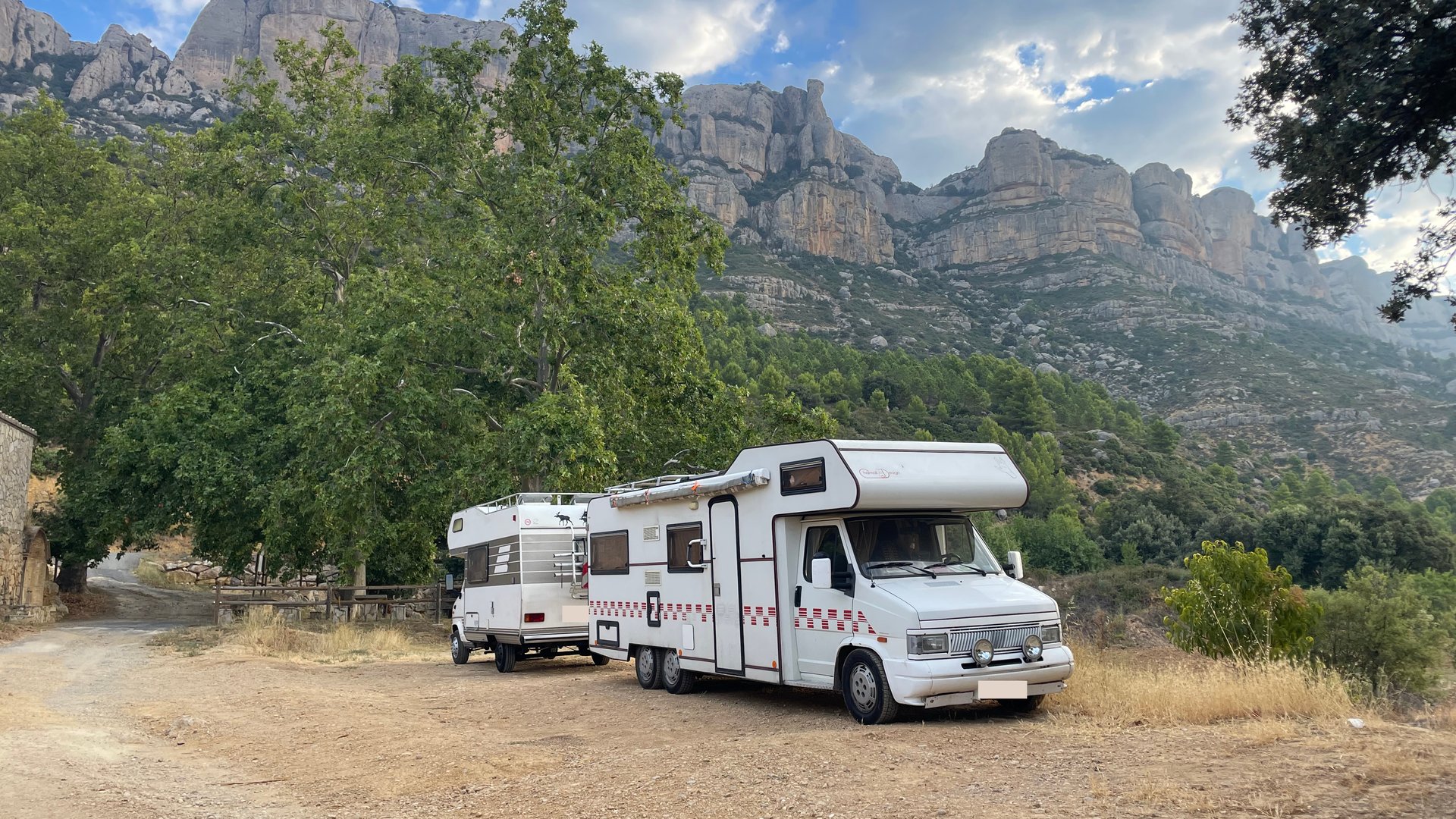 Van parked at a scenic viewpoint at sunset